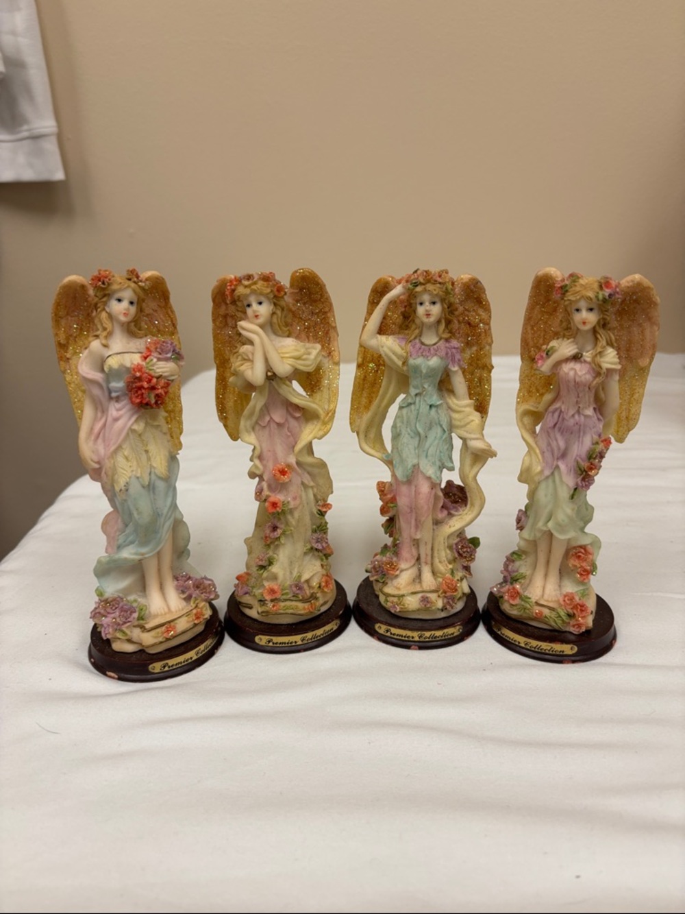 Set of Four Pastel Angel Figurines with Gold Wings
